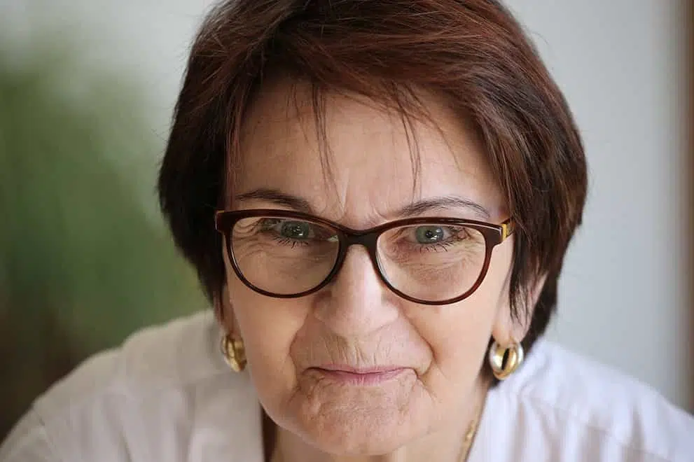 An image of an older woman smiling at the camera to represent "Trusts Services in Waynesville NC" symbolically